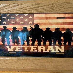 Veteran Silhouette American Flag Metal License Plate